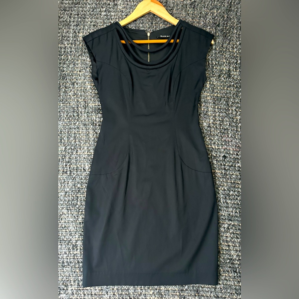 Black Halo cocktail dress with double corded scoop neckline. Size 2
